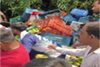 Mangaluru: Lorry laden with mangoes overturns; driver injured